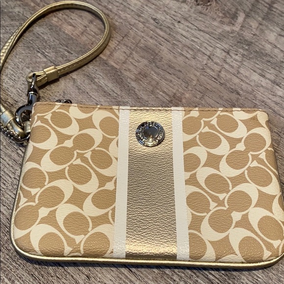 Coach Handbags - New Gold & tan Coach signature wristlet